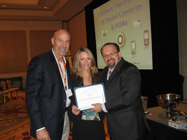 Representatives for ADDvantage accepting the award from Realtor.com